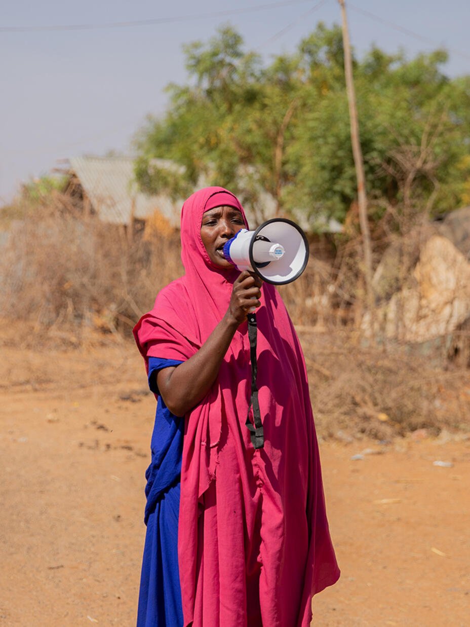 Zainab speaks into a megaphone in Helowyn camp in Ethiopia.
