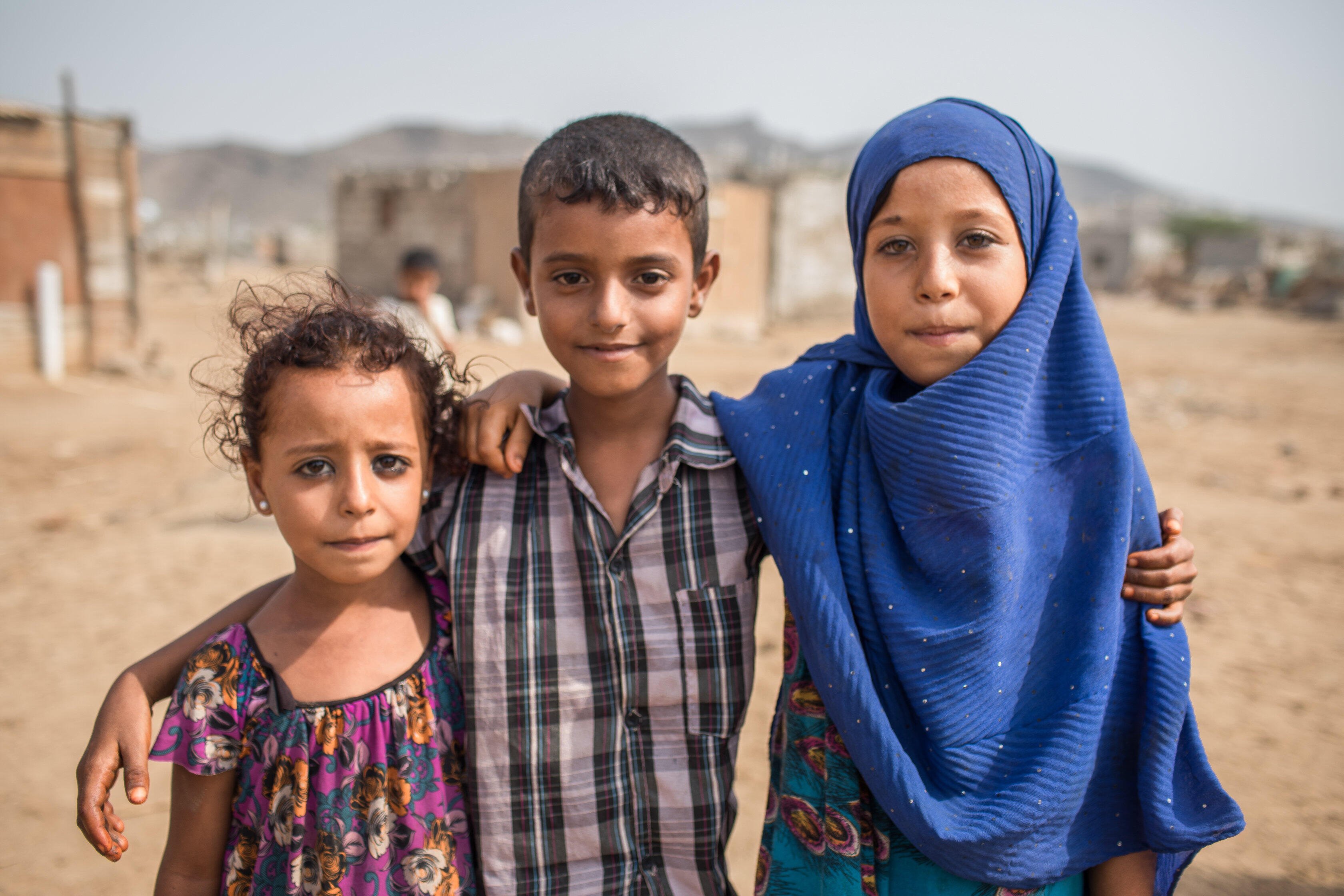 Three children in a remote village in Yemen
