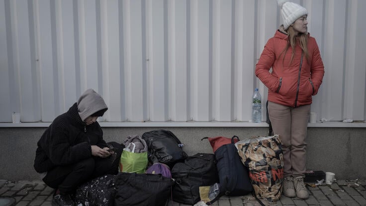 Ukrainian refugees gather at Przemysl railway station. 