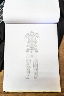 One of Lincy's skateches, showing her design for a jeans and blouse outfit
