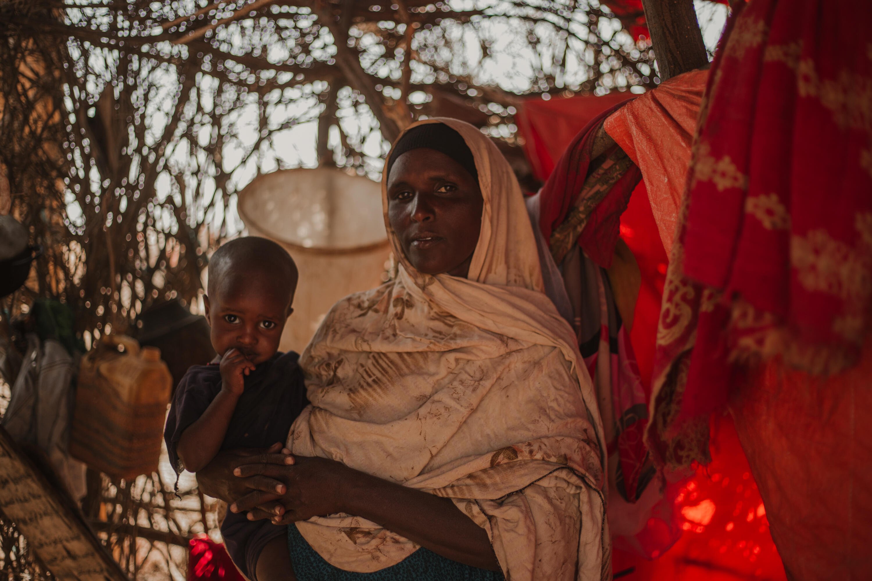 Sehiwi Kebdid, 35, and her baby Nejma Bashir live in Ethiopia's Somali region, Sehiwi says the drought has caused her to lose a lot of her livestock. 