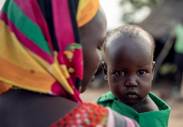 Peter, 2, benefits from the IRC's nutrition programme in Northern Bahr El Ghazal, South Sudan, after he and his mother were displaced by flooding.