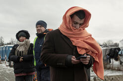 Ukrainian refugees gather at Przemysl railway station. 