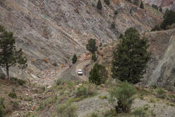 Image of IRC mobile health van driving through twisting roads