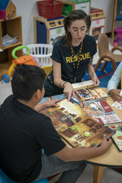 Staff support children at the Welcome Center in Phoenix.