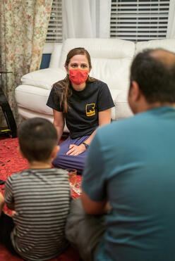 IRC Clients meet with IRC staff member.