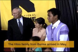 Boo introduces his family to Former Secretary of State, General Colin Powell, when he visited IRC in Phoenix office back in 2007.