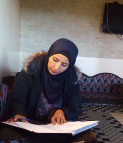 Samira prepares an information session for women in her community. 