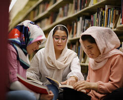 Afghan women reading in a library 