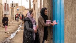 Blossom Pads handing out products in Afghanistan