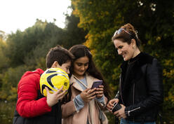 Zahra and her two children spending time at the local park in their new hometown, High Wycombe, Buckinghamshire.