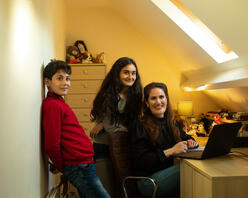 Zahra with her daughter and son in an office in in High Wycombe, Buckinghamshire, Southeast England.
