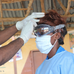 Staff participating in infection prevention and control (IPC) training run by the IRC's partner Concern Worldwide, in Sierra Leone.