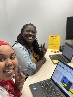 Samia Katun and Shaina Applewhite in a selfie making the  "peace" sign with their hands.