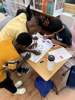 students at summer academy doing an activity.