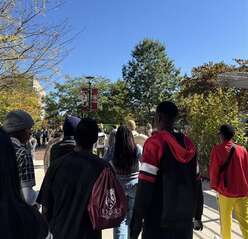 An image of young people exploring a college campus. 