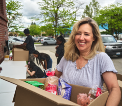 Instacart delivery courier dropping off groceries