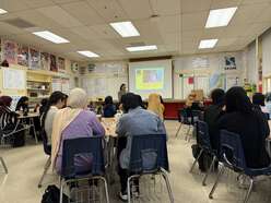 InspiHER girls learning from IRC staff