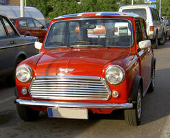 Morris Mini Cooper car with a British Union Jack flag design on its roof