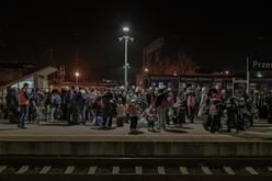 Ukrainian refugees gather at Przemysl railway station.