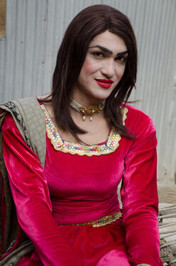 Namkeen smiling dressed in pink.
