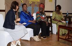 Panel discussion with four women from Kenya sitting in a half circle.