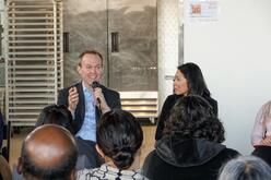 Rep. Ben McAdams discusses Utah's history of welcoming refugees at a meet & greet hosted by Spice Kitchen Incubator, a program of the International Rescue Committee (IRC) in Salt Lake City.