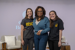 Camille André, who spoke with Oprah Winfrey about the IRC's work aiding asylum-seeking families on the US-Mexico border, with Oprah and IRC colleague Hope Arcuri in Phoenix, Ariz. in Feb. 2020.