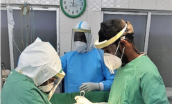 Dr. Lilian Mumbua of the IRC and medical staff prepare for a C-section surgery