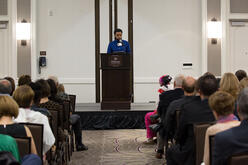 Abdisalan speaking at IRC in San Diego's annual fundraiser.