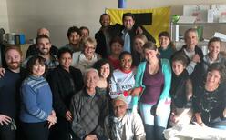 Group photo of IRC Seattle staff with Mr. Long