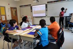 IRC RYSA students learning in a classroom.