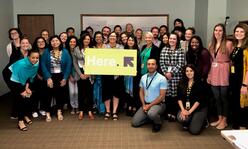 Suzy Cop, center, Executive Director for the IRC in Texas.