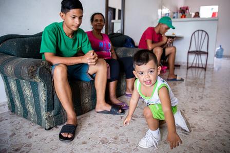 The International Rescue Committee helped place Cibel's youngest son Matías in preschool. Cibel's youngest son, Matías, plays at home with his cousin, aunt and older brother nearby.