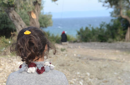 Seven-year-old Mubarak and her family nearly died making the treacherous voyage on a rubber raft from Turkey to Lesbos. Seven-year-old Mubarak, a refugee on the island of Lesbos, looks out to sea.