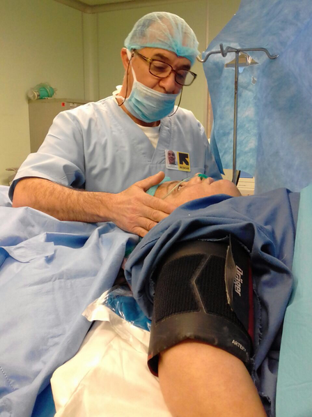 IRC anesthesia technician Hedi Kharroubi tends to a patient in the operating room of Libya's Misrata Central Hospital.