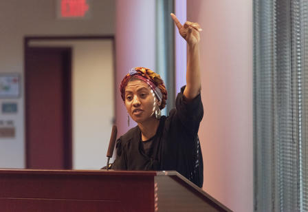Speaker Elham Khairi engages the audience during her anti-bias exercise.