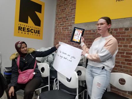Students used tablets to take pictures around the office and practiced English by describing those photos. Students in the International Rescue Committee's ESL class used tablets to take pictures around the office and practiced English by describing those photos.