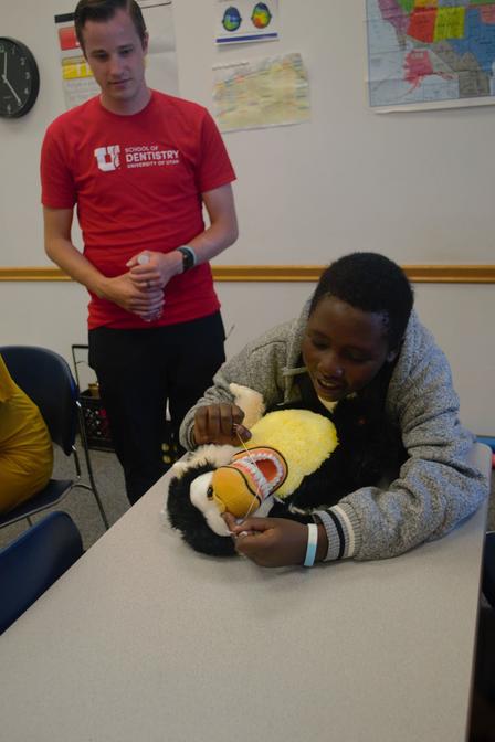Refugee children practice healthy oral hygiene at the Refugee Health Fair, an event organized by the International Rescue Committee in Salt Lake City.