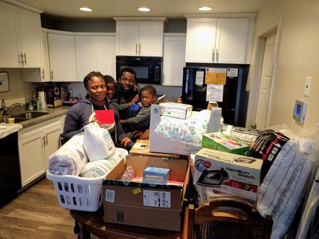 Refugee family receives gifts during the IRC in Salt Lake City's annual holiday drive. Refugee family receives gifts during the International Rescue Committee in Salt Lake City's annual holiday drive.