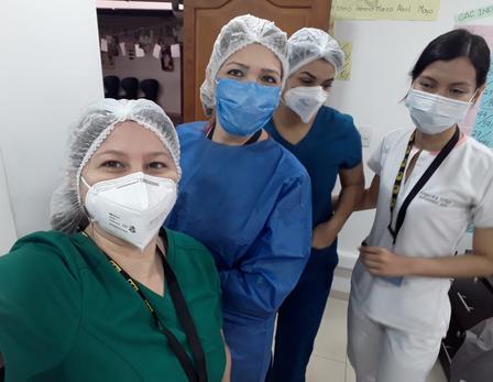 Staff in the IRC clinic in Cúcuta pose for a selfie in between seeing patients. Staff in the IRC clinic in Cúcuta pose for a selfie in between seeing patients.