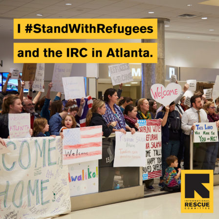 A graphic of a large group of people standing in an airport while holding banners and signs welcoming refugees.