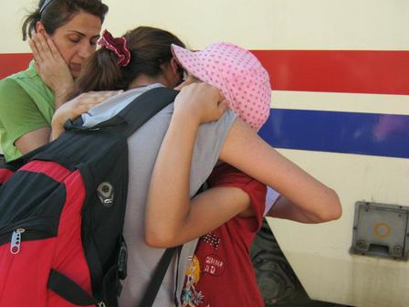 Rooha Haghar is welcomed to America by her family. Refugee Rooha Haghar starts her life over in Dallas, TX in 2012.