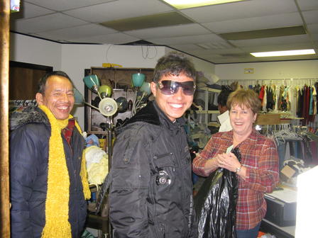 Susan helping two of her "shoppers" in the former Resettlement Shop, now named the Shop of Hope in her honor. Susan helping two of her "shoppers" in the former Resettlement Shop, now named the Shop of Hope in her honor.