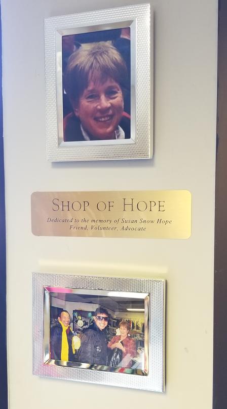 Shop of Hope dedication plaque and photographs to remember and honor Susan. Shop of Hope dedication plaque and photographs to remember and honor Susan.