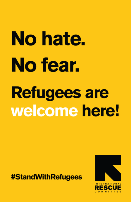 Stand with refugees Posted reads: "No hate. No fear. Refugees are welcome here! #StandWithRefugees"