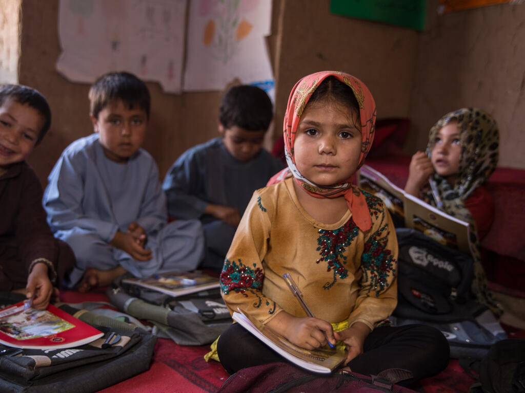 Child learning at an IRC Safe Healing and Learning Space in Afghanistan.
