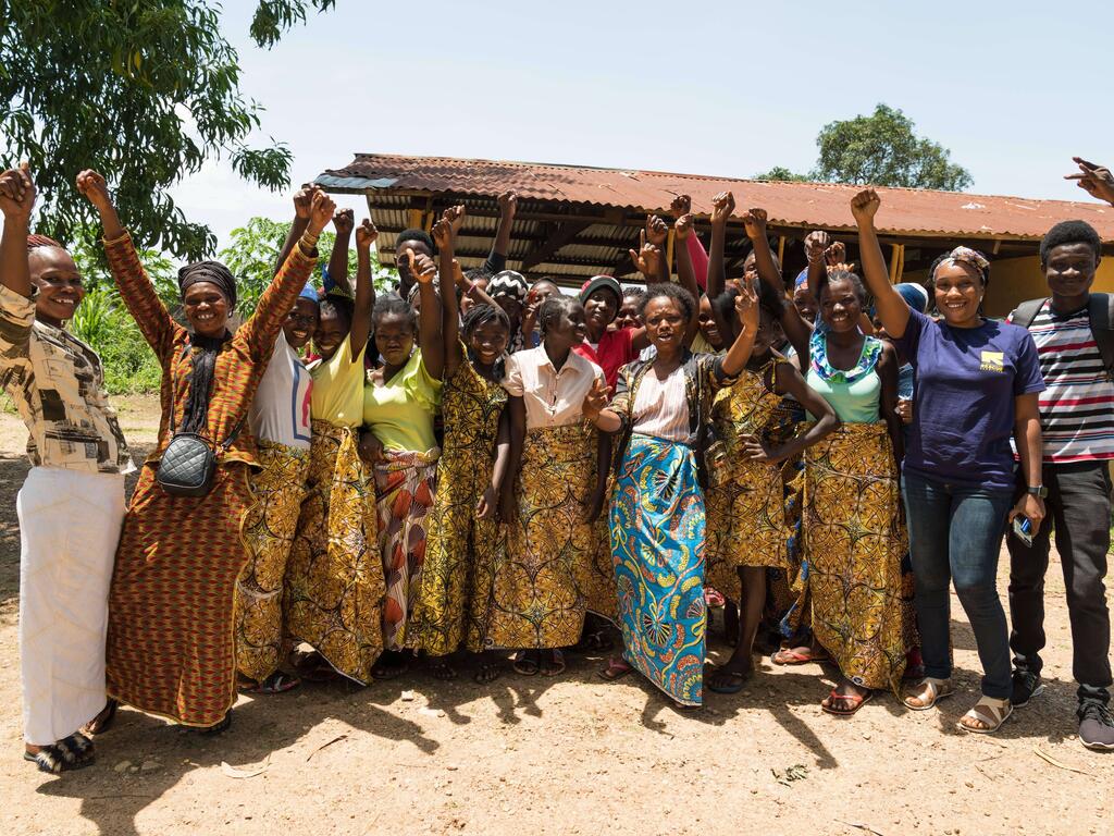 A group of EAGER Students posing for a group photo outside.