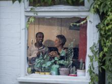 two women in a window