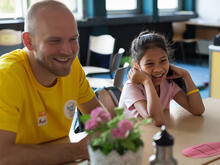 Teacher Marlin and student Kathlyn at the IRC's healing classrooms summer programme in Germany.